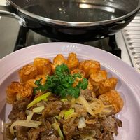 可能是快炒和肉排的圖像