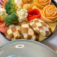 可能是豆腐、起司火鍋、火鍋和文字的圖像