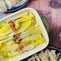 可能是火鍋、麵、豆腐和文字的圖像