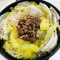 可能是豆腐、火鍋、麵和文字的圖像