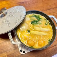 可能是火鍋、豆腐和文字的圖像