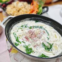 可能是豆腐、粥、麵和文字的圖像