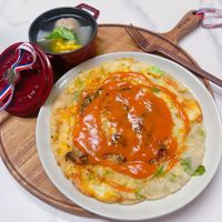 可能是麵、歐姆蛋、粥和文字的圖像