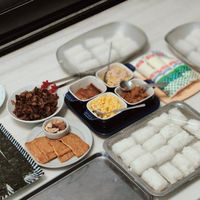 可能是豆腐、壽司和文字的圖像