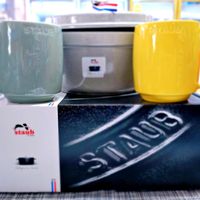 可能是咖啡杯、咖啡機和文字的圖像