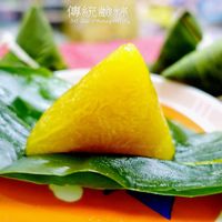 可能是甜點和顯示的文字是「傳統險粽 SC Lei iPhotography Photog 」的圖像