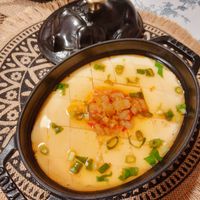 可能是火鍋、粥和豆腐的圖像