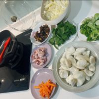 可能是火鍋、麵和豆腐的圖像