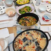 可能是火鍋、豆腐和文字的圖像