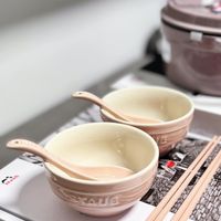 可能是木湯匙、粥和文字的圖像