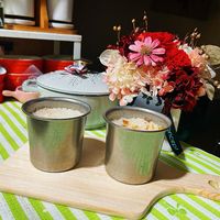 可能是粥、咖啡杯、滿天星和文字的圖像