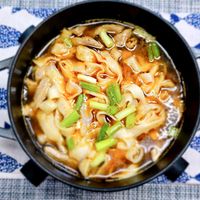 可能是火鍋、豆腐和香菇的圖像