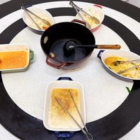 可能是蛋黃、起司火鍋和粥的圖像