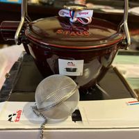 可能是茶、泡茶器和文字的圖像