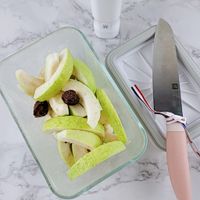 可能是梨子、蘋果和刀的圖像