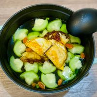 可能是火鍋、豆腐和粥的圖像