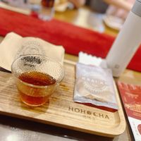 可能是咖啡機、泡茶器、飲料和文字的圖像