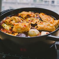 可能是火鍋、西班牙大鍋飯和豆腐的圖像