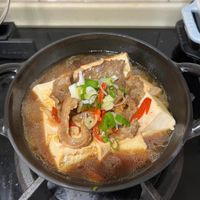 可能是燉小牛膝、豆腐和粥的圖像