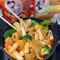可能是火鍋、豆腐和文字的圖像