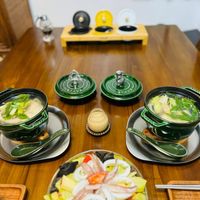 可能是拉麵、豆腐、火鍋和文字的圖像