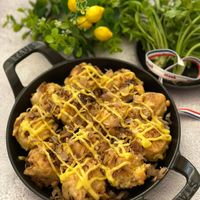 可能是豆腐、印度香料飯和文字的圖像