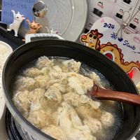 可能是火鍋、豆腐、粥和文字的圖像