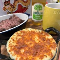 可能是肉餡餅、舒芙蕾、牧羊人派和文字的圖像