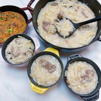 可能是‎豆腐、麵、粥和‎顯示的文字是「 ‎GOVES SYAUB סשמיל TAUO EAvLs‎ 」‎‎ 的圖像