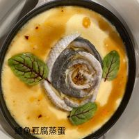 可能是粥和顯示的文字是「 STANS 魚豆腐蒸蛋」的圖像