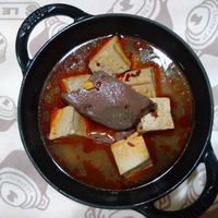 可能是火鍋、豆腐和文字的圖像
