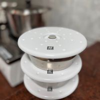 可能是鬆餅機、熱水器和文字的圖像