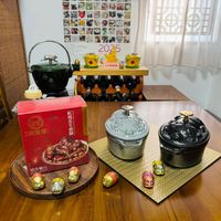可能是火鍋、泡茶器和文字的圖像