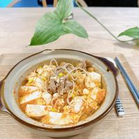 可能是豆腐、火鍋、麵、拉麵和文字的圖像