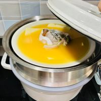 可能是起司火鍋和蛋黃的圖像