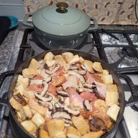 可能是豆腐、燉小牛膝和香菇的圖像