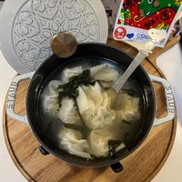 可能是火鍋、粥、豆腐和文字的圖像