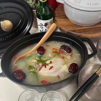 可能是火鍋、粥、豆腐和文字的圖像