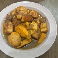 可能是豆腐和燉小牛膝的圖像