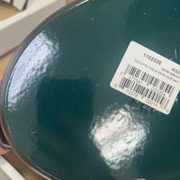 可能是顯示的文字是「 3 COCOTTE 1102325 1102325 OVALE 1003189 23CMNOI NOIR 40500-231 40650-234 W32 23M 3CM MAT 8 272341 72078 023254 ج 00015 8 」的圖像