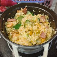 可能是北非小米飯、炒飯和顯示的文字是「南瓜燉飯 dAs vivo X70 Pro+ ZEISS SUADE 2025/06/11 11:58 」的圖像