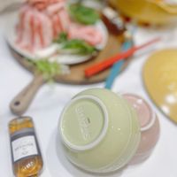 可能是豆腐、火鍋和顯示的文字是「 STAUE 1 AUB 22211 #"ኒ 」的圖像