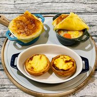 可能是舒芙蕾、肉餡餅、牧羊人派和文字的圖像