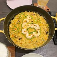 可能是西班牙大鍋飯、粥和蝦的圖像
