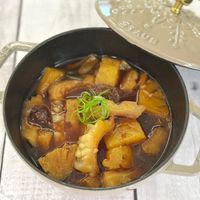 可能是火鍋、豆腐、香菇和文字的圖像