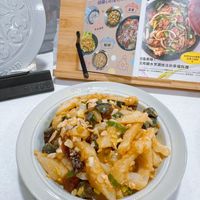 可能是拉麵、義大利麵、豆腐和文字的圖像