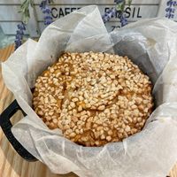 可能是食物和顯示的文字是「 100%ARAP ARAPA 100% CAFR SIL ФИTTO 」的圖像