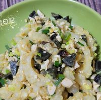 可能是豆腐、義大利麵和文字的圖像