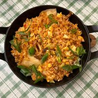 可能是炒飯、西班牙大鍋飯和印度香料飯的圖像
