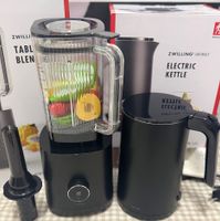 可能是研磨機、泡茶器和顯示的文字是「 ZWILLING ZW ZWIL ZWILLI TABL BLEN ሽ ZWILL ZWILLING ZWILLING*ENFINIG ENFINIGY ELECTRIC KETTLE 」的圖像